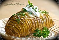Triple-Cheese Hasselback Potatoes with Crispy Herb Topping