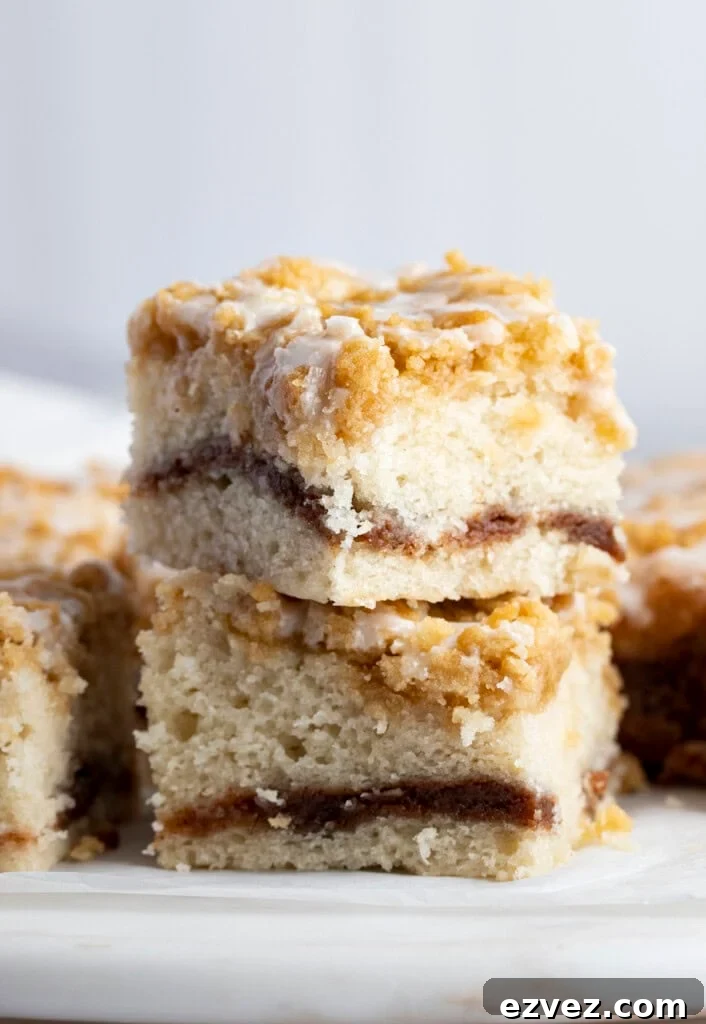 Vegan Coffeecake with Cinnamon Streusel Topping 2 Two squares of vegan coffee cake stacked on top of each other