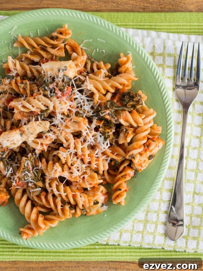 Easy Chicken with Pasta Dinner Recipe - Dress up your spaghetti with chicken, spinach, and a bit of spice!