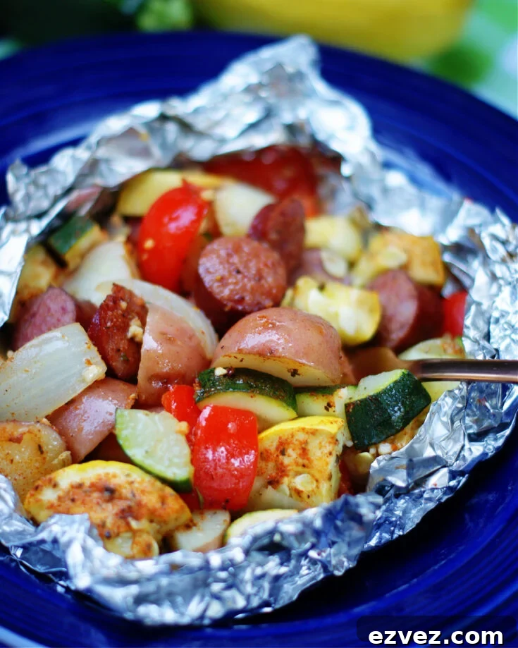 Easy summer dinner with grilled garden vegetables and smoked sausage foil packets