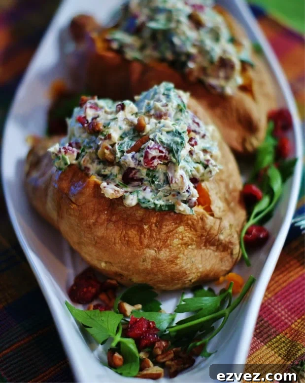 2 Stuffed sweet potatoes on a white dish