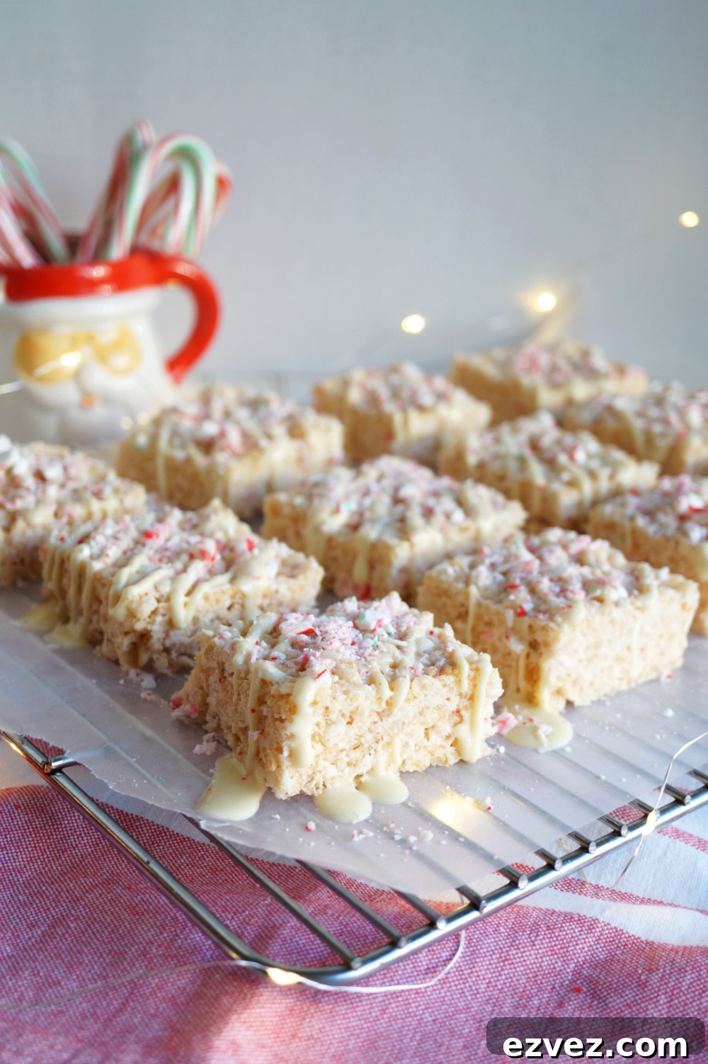rice Krispie treats on cooling rack with lights