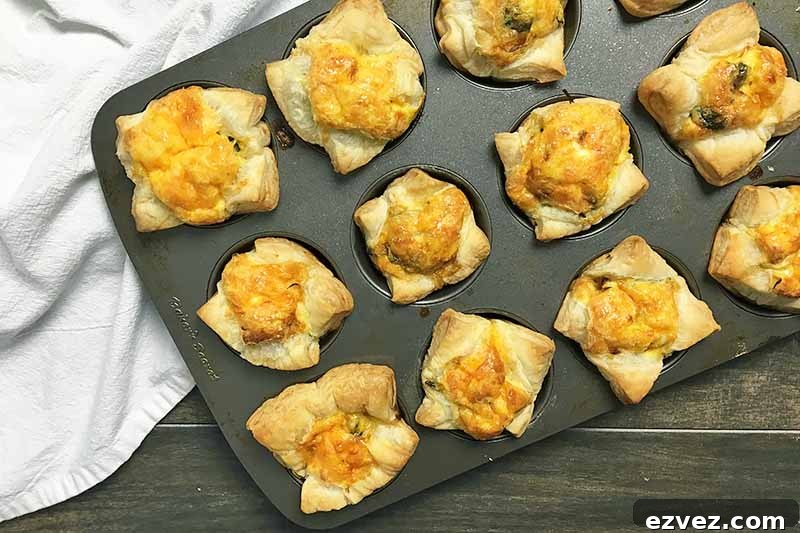 Horizontal image of baked pastries in a muffin tin.