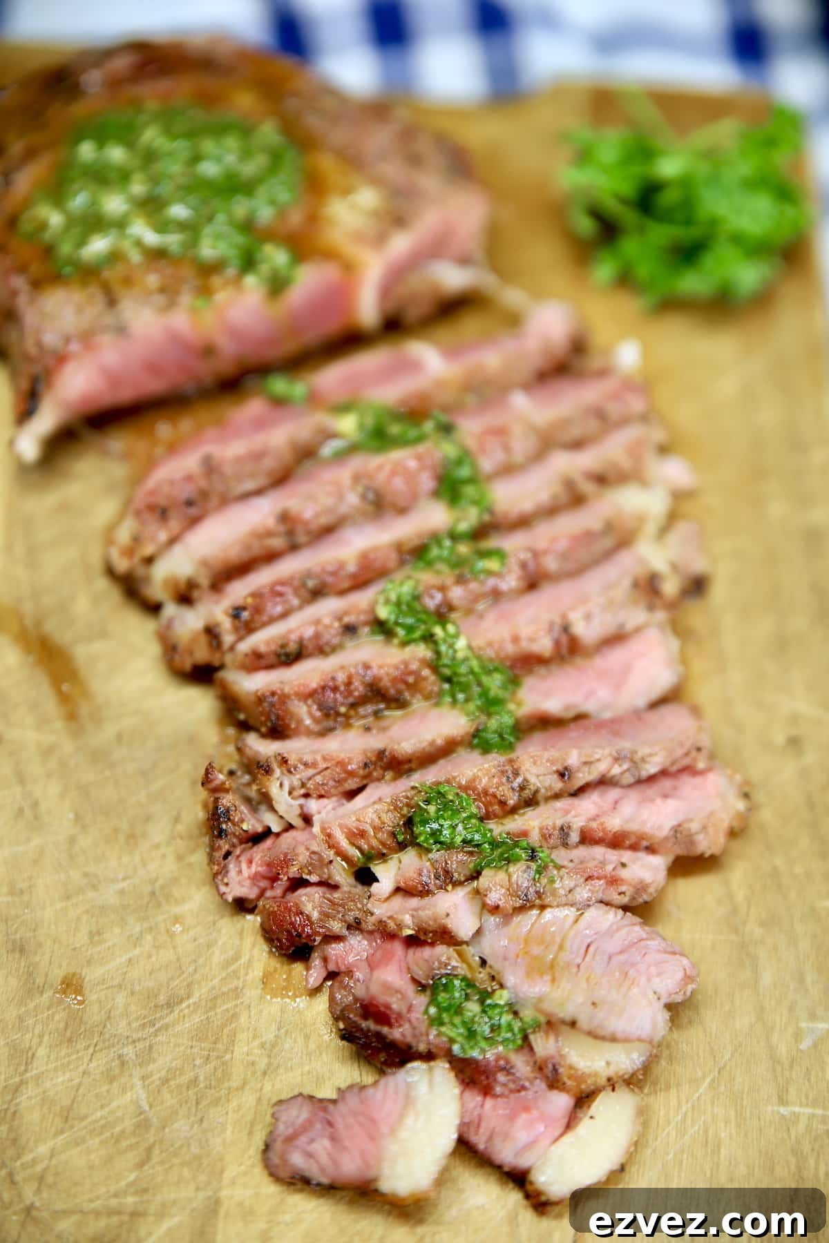 Steak chimichurri on a cutting board.