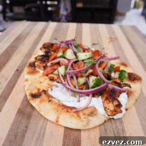 Authentic Grilled Chicken Shawarma Recipe for Flavorful Meals 15 Grilled Chicken Shawarma on a pita.
