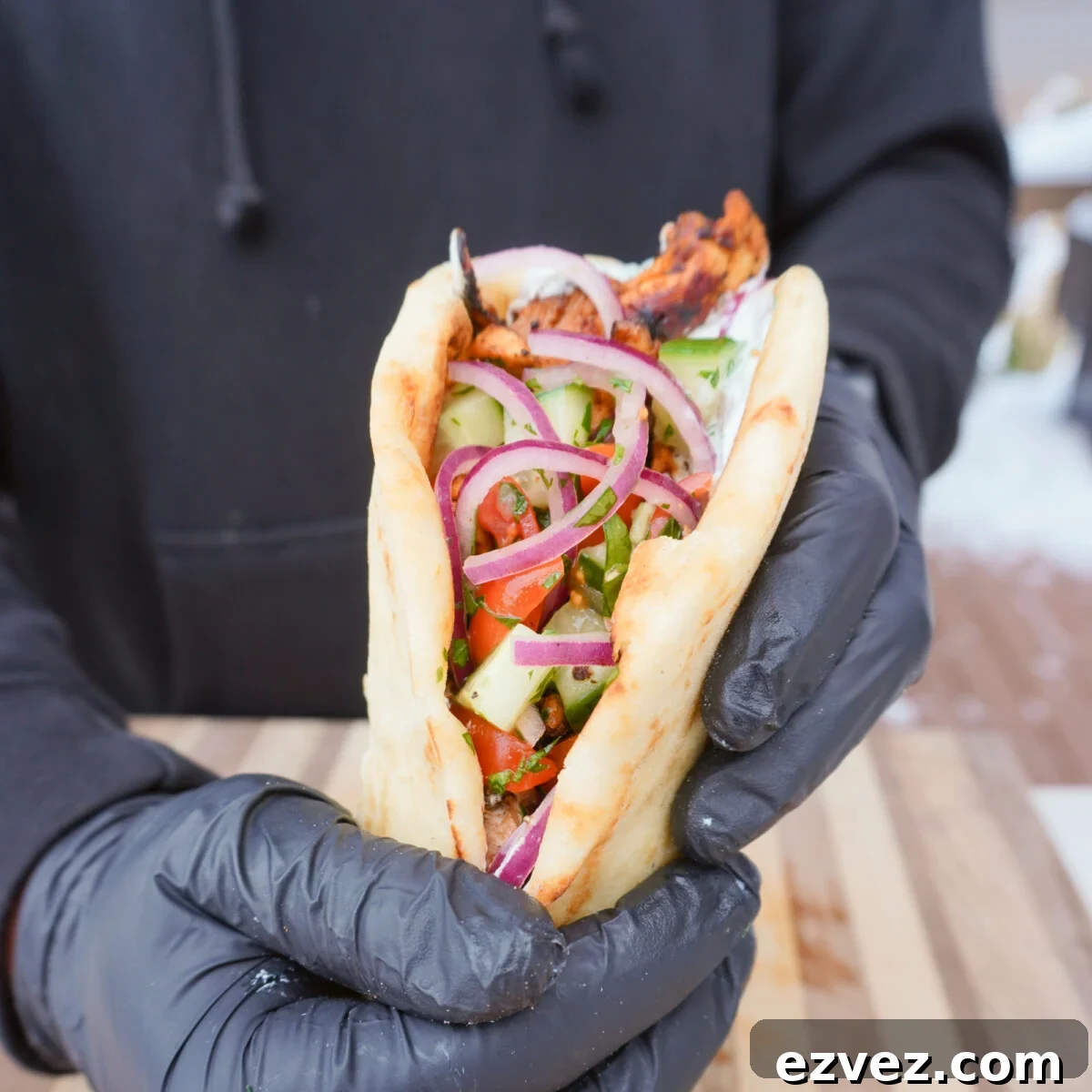 Authentic Grilled Chicken Shawarma Recipe for Flavorful Meals 10 grilled chicken shawarma wrapped in a pita.