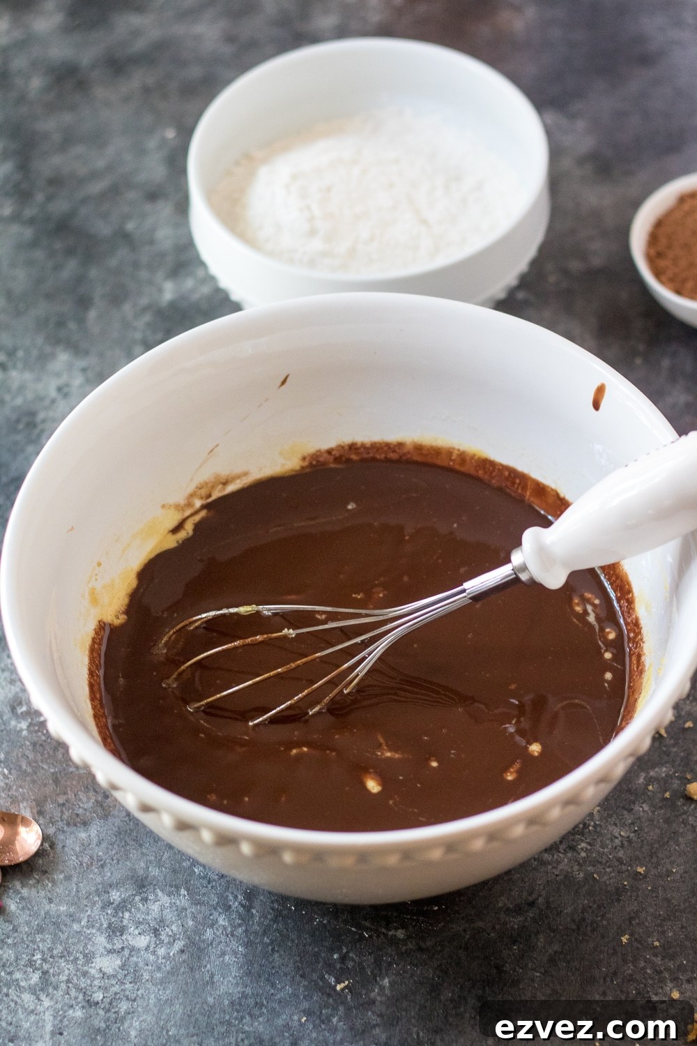 Cosmic Brownies Recipe — Fudgy, No-Bake Chocolate Squares 5 melted butter and chocolate for the cosmic brownie batter