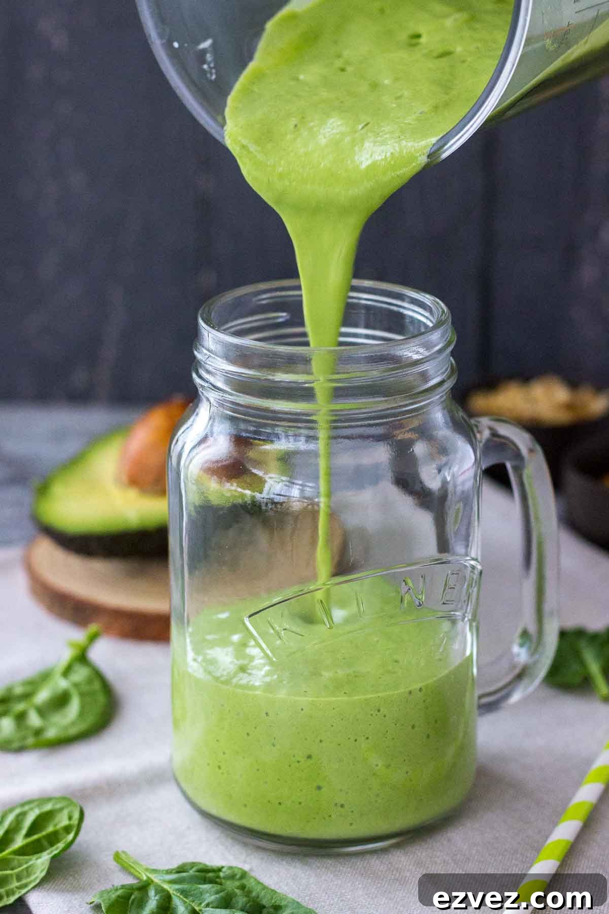 Pouring Avocado Smoothie in a glass