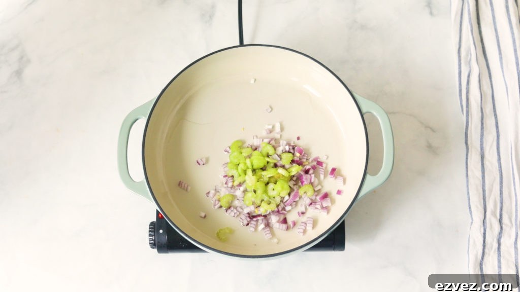Sauteeing onions and celery in a large pot