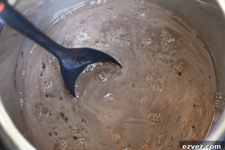 mixing cream and cocoa in the instant pot
