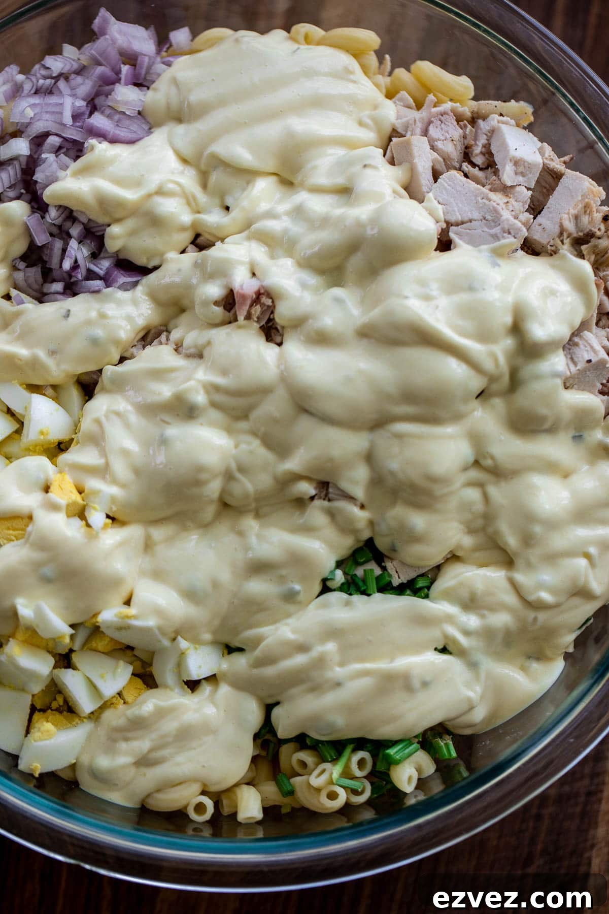 Creamy Chicken Macaroni Salad with Tangy Herb Dressing 7 Creamy dressing over salad ingredients