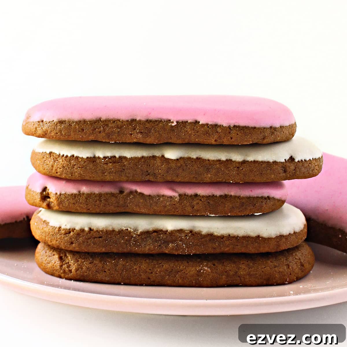 Irresistible Honey Jumbles Cookies Recipe for Crispy, Sweet Bites 6 Stack of iced oval honey cookies.