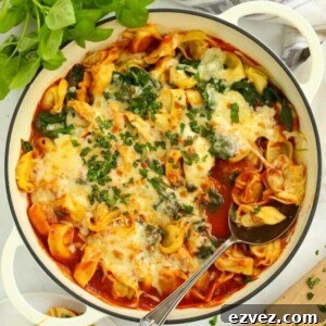 A pan full of fresh tortellini lasagne - a simple 10 minute meal.