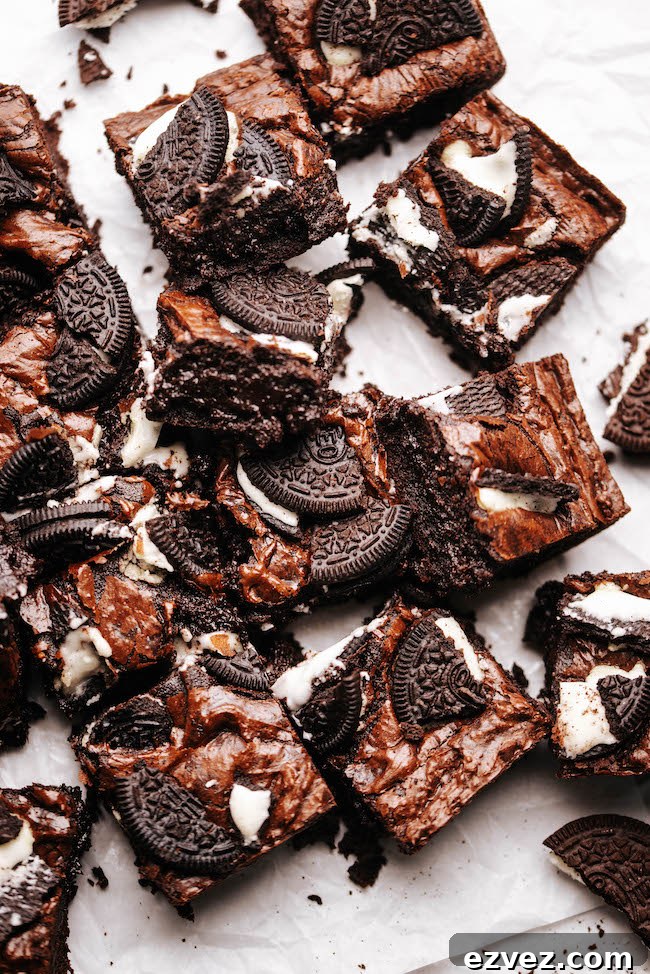 Sliced oreo brownies on parchment paper
