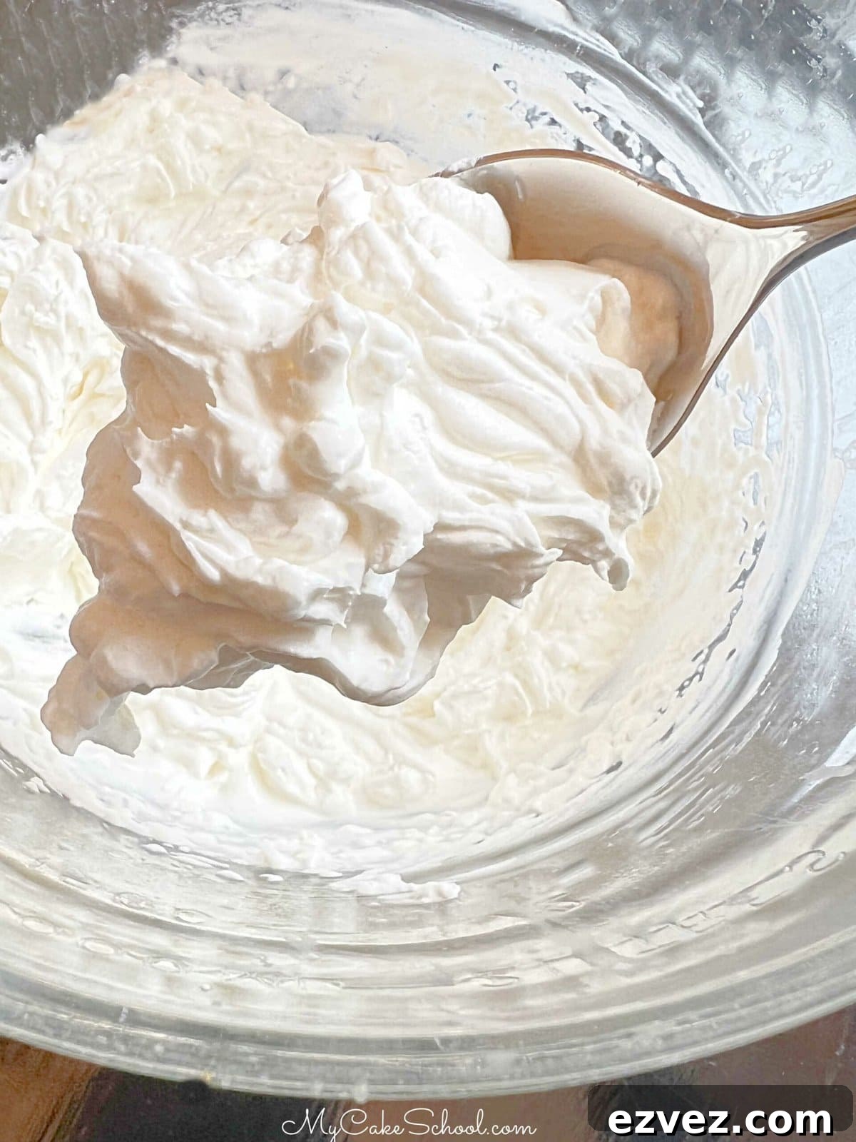Spoonful of homemade whipped cream
