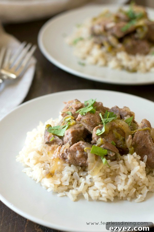 Fire-Roasting Hatch Chiles: Step-by-Step Guide + 12 Delicious Recipes 9 Two plates of lamb and hatch chile stew over rice.