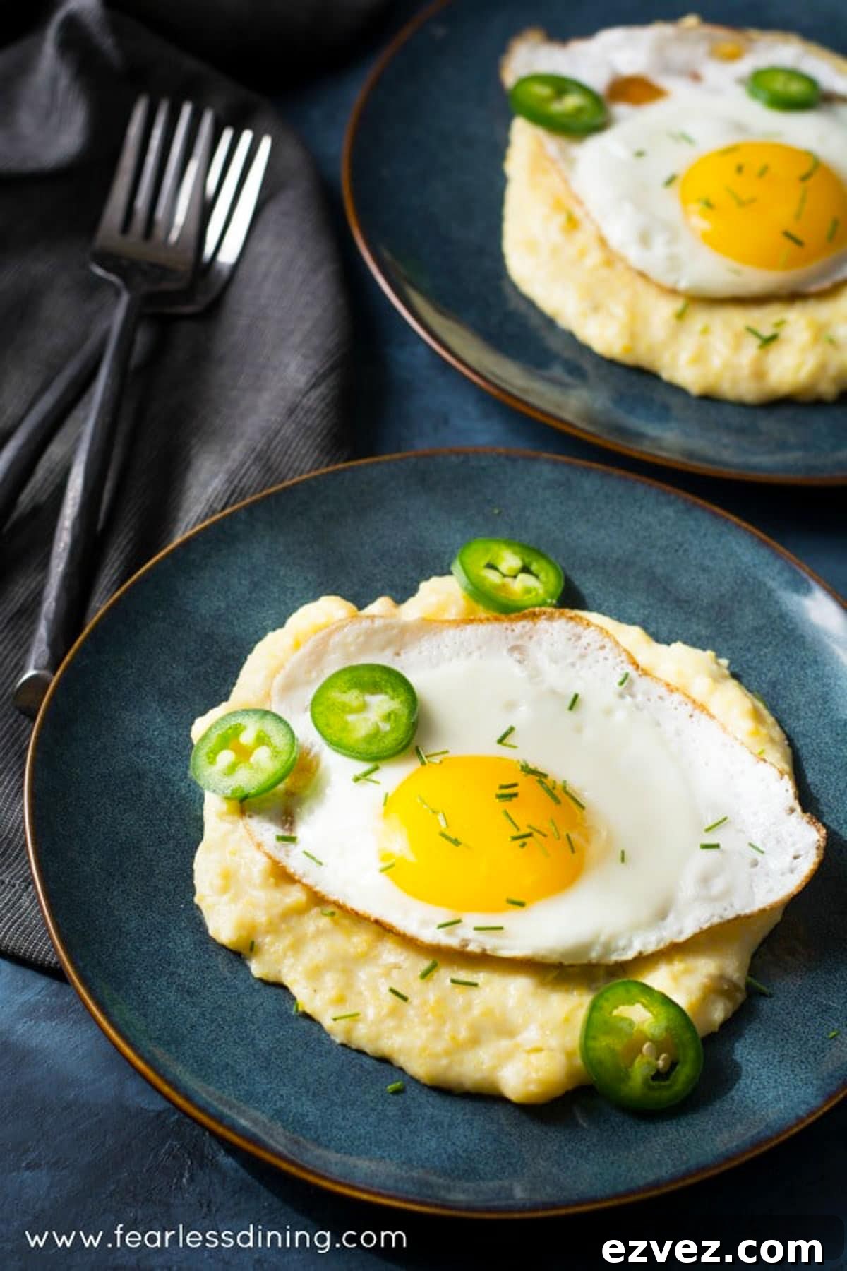 Fire-Roasting Hatch Chiles: Step-by-Step Guide + 12 Delicious Recipes 10 Cheese grits with a sunnyside up fried egg on top.