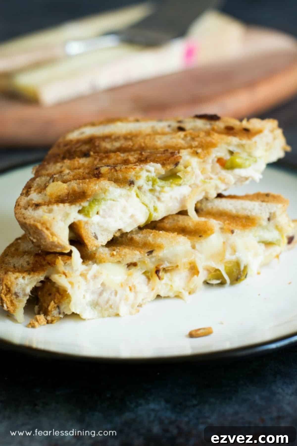 Fire-Roasting Hatch Chiles: Step-by-Step Guide + 12 Delicious Recipes 7 Two halves of a tuna panini stacked on top of each other.
