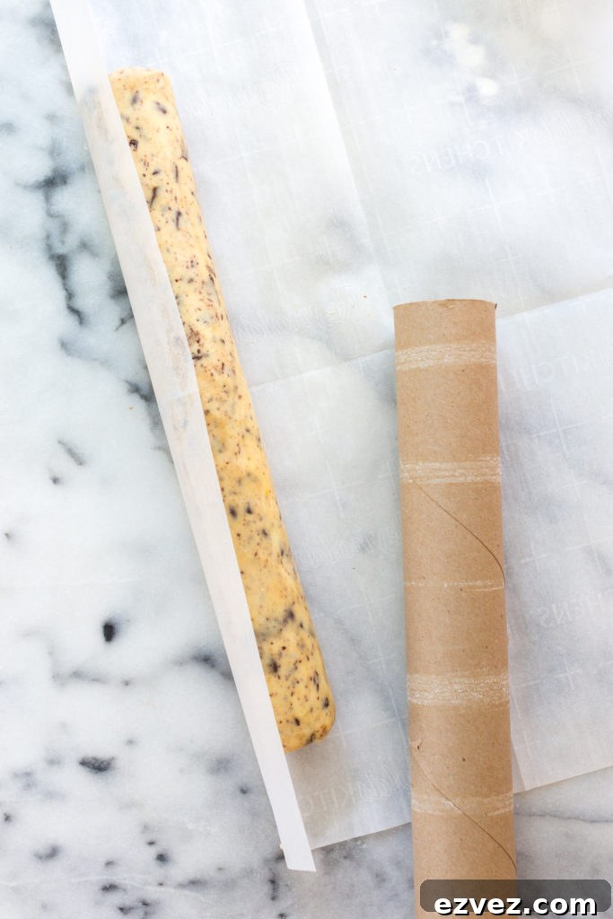 Shaping shortbread cookie dough into logs