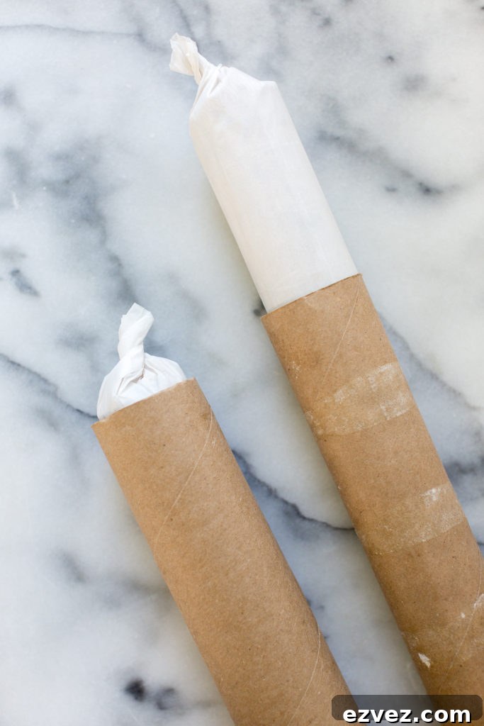 Shortbread cookie dough logs in paper towel rolls to keep round shape