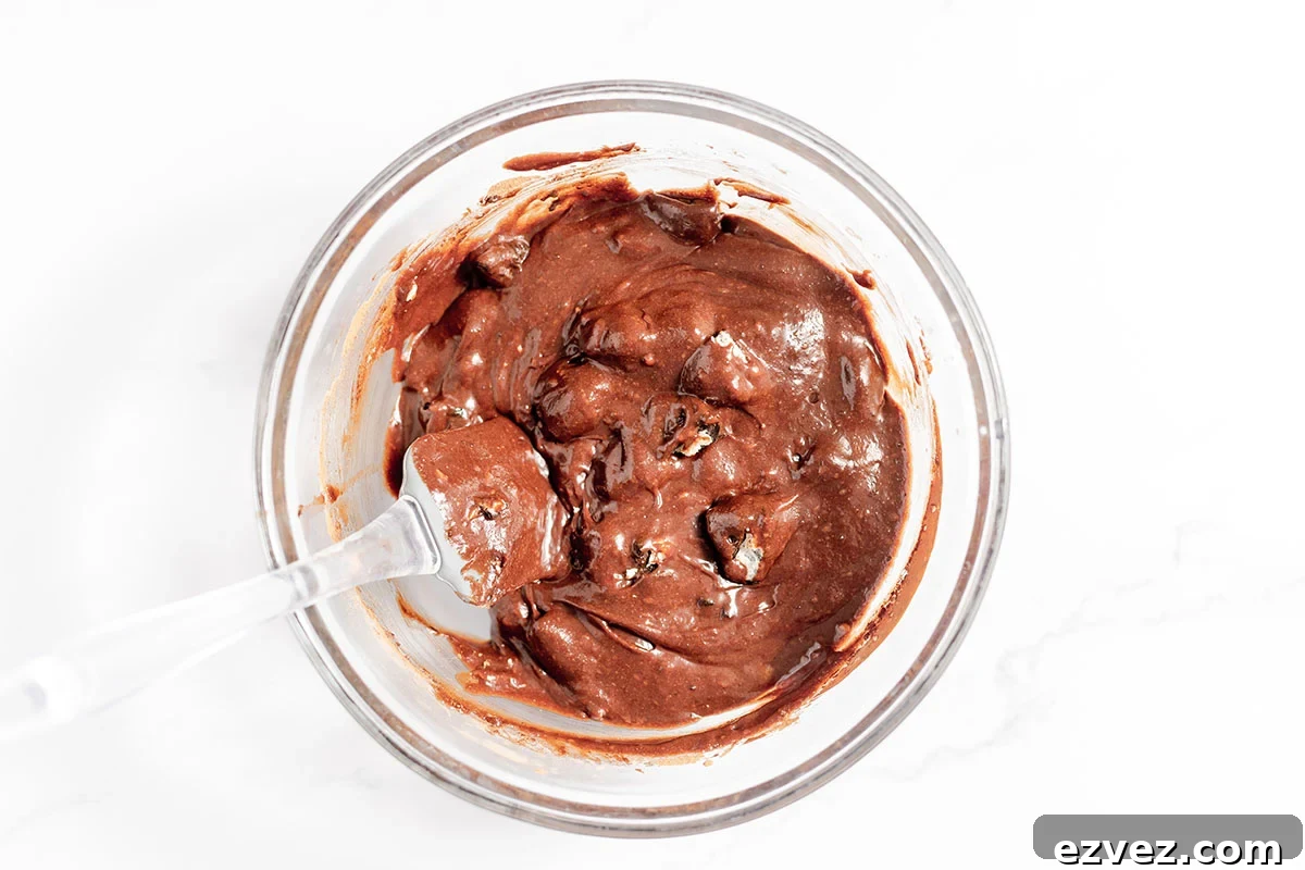 Cookies & Cream Brownies Recipe — Fudgy Oreo-Stuffed Brownies 8 Cookies and cream brownie batter in a mixing bowl.