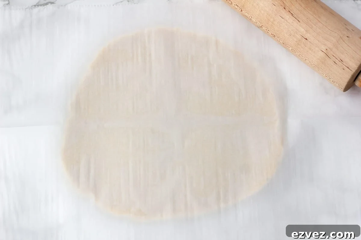 parchment paper covering flat cookie dough
