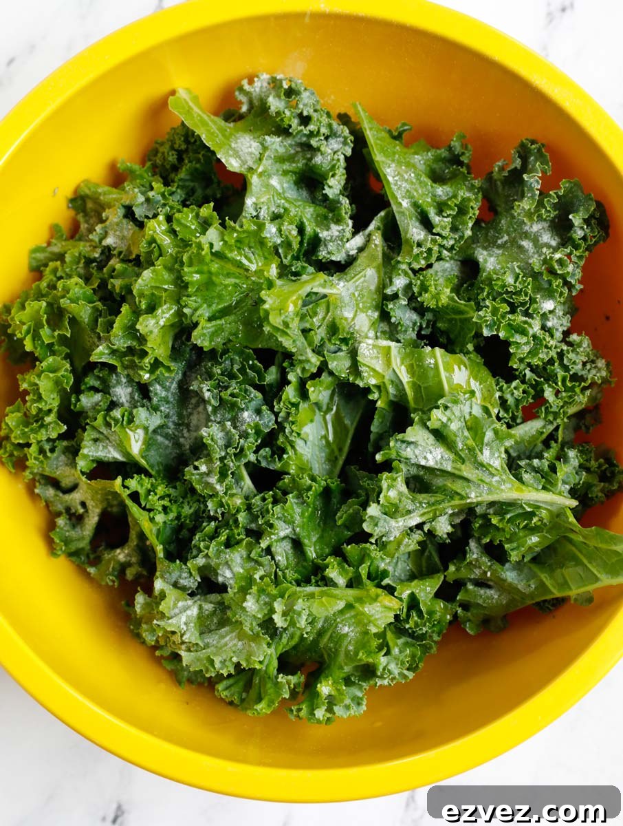 Crispy Kale Chips from the Air Fryer: Quick Crunch Snack 6 Kale leaves in a bowl to turn into chips.