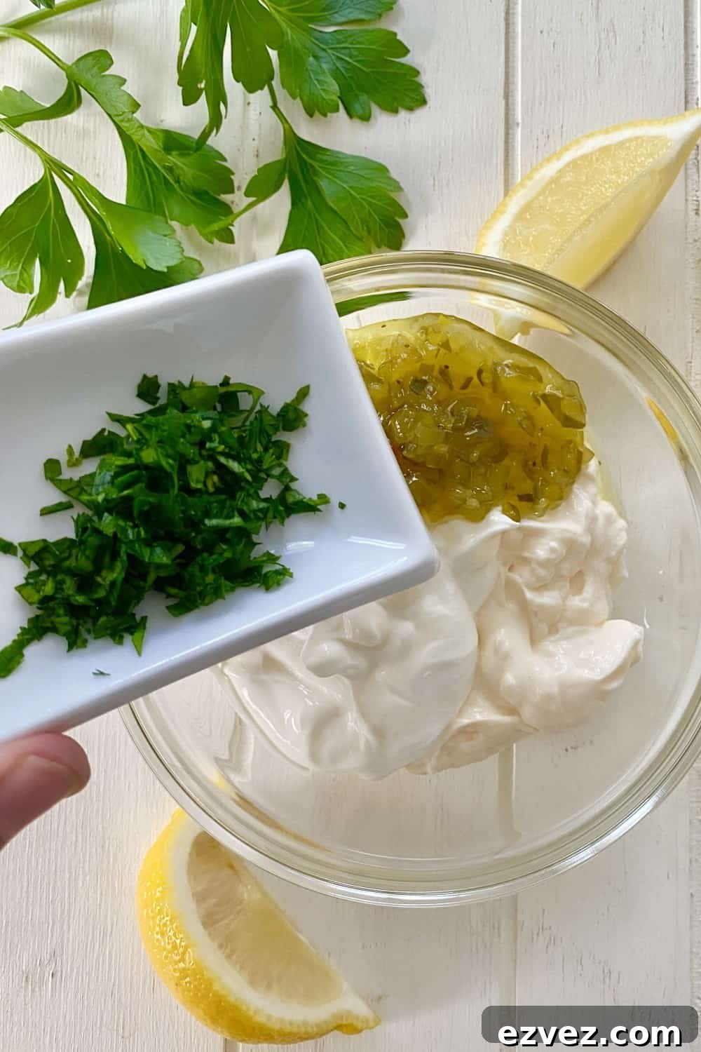 sour cream, mayo, sweet pickle relish, fresh parsley, lemon