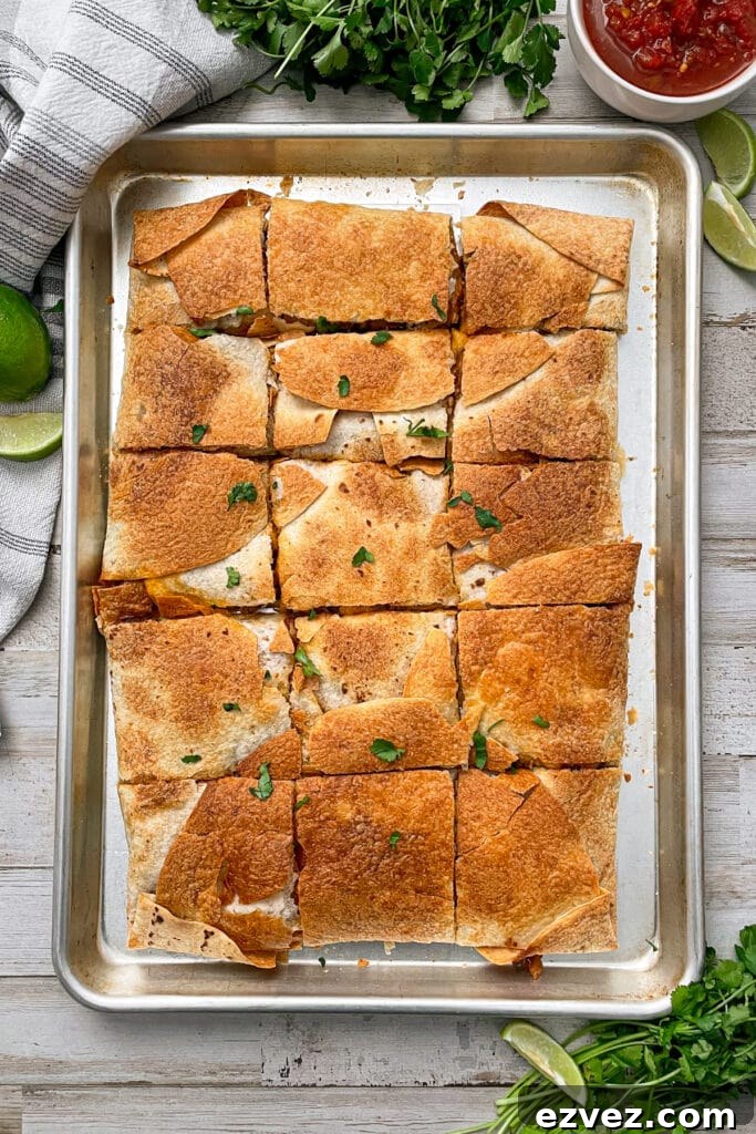baked ground beef quesadillas cut into individual square.