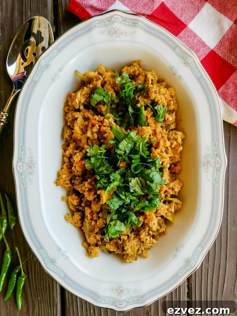 Kkeema Kareley (ground beef and bitter mellon) in an oval dish garnished with cilantro.