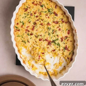 Cheesy Corn Casserole served in a casserole dish.