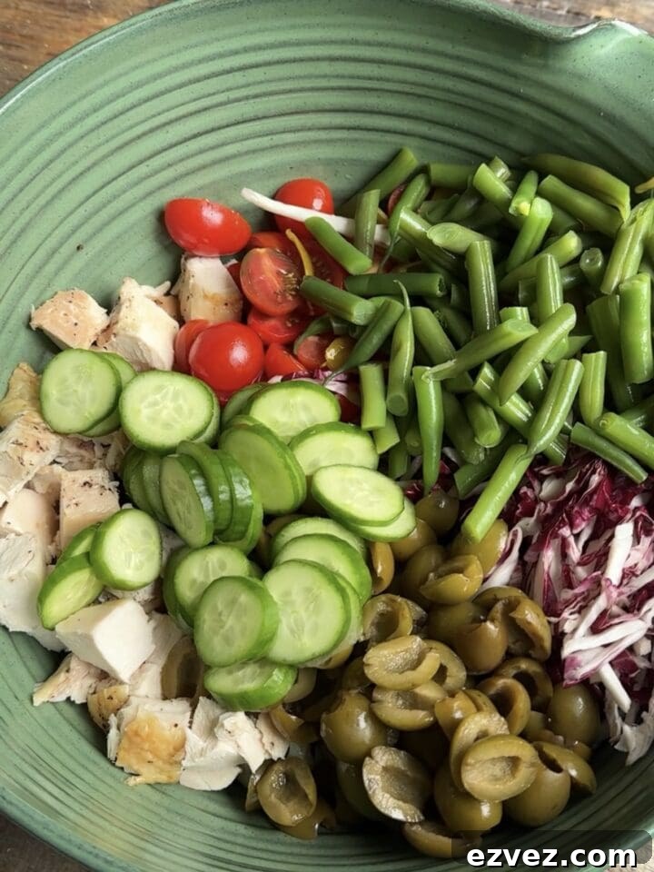 a photo of summer salad ingredients in a bowl