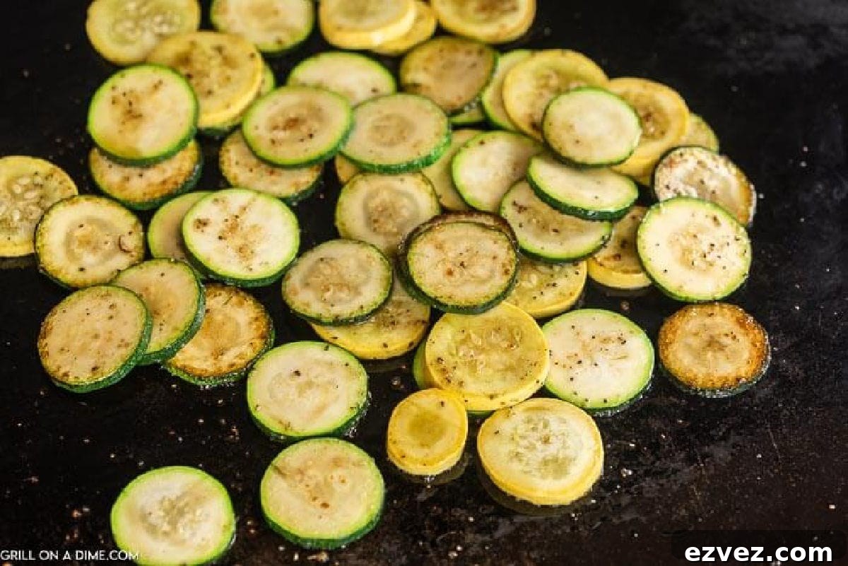 Slice Zucchini and Squash on a blackstone griddle.