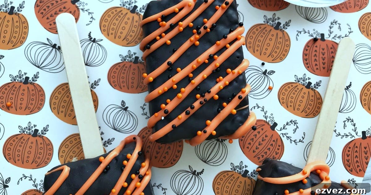 chocolate covered halloween krispie pops