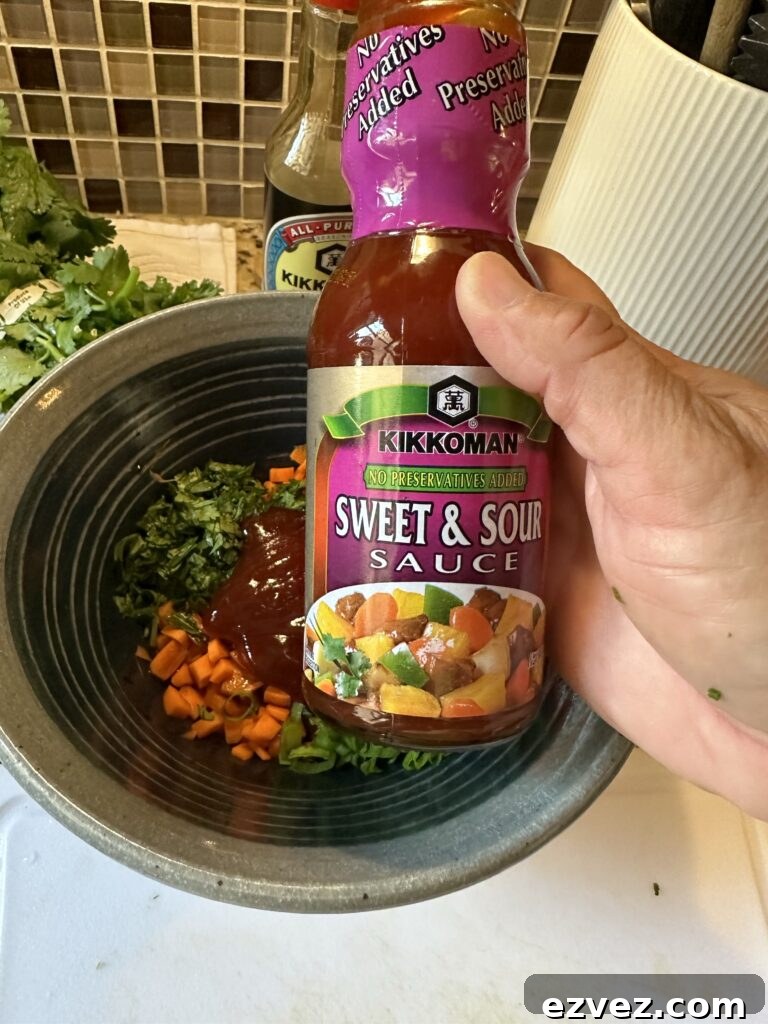 A bottle of Kikkonman Sweet and Sour Sauce