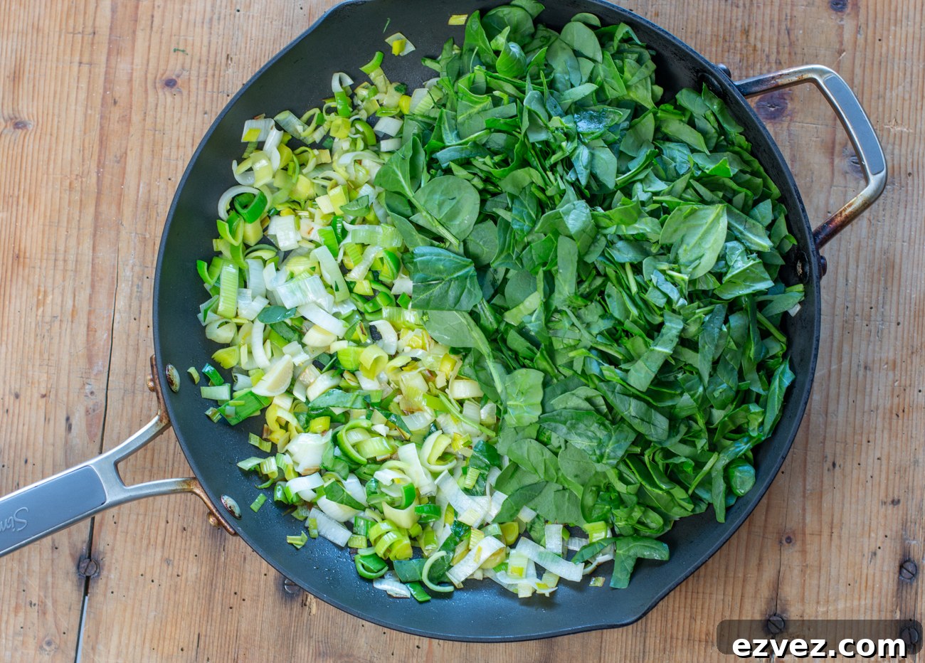 Sauté leeks and garlic, then add the spinach