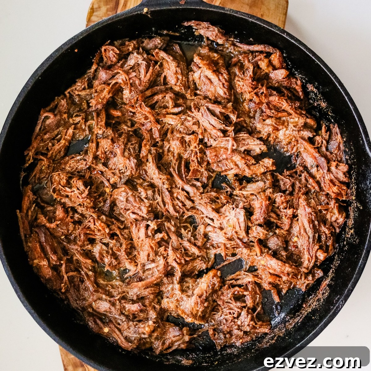 Slow-Cooker Shredded Beef Tacos for Flavorful Weeknight Meals 6 Sautéing beef in a pan.