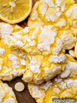 Top view of a lemon crinkle cookies missing a bite.
