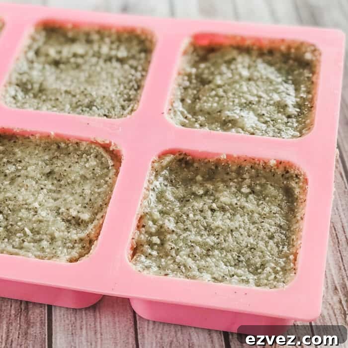 DIY Lush Buffy Bar with essential oils mixture in silicone molds for cooling and formation into homemade Lush Buffy Bars