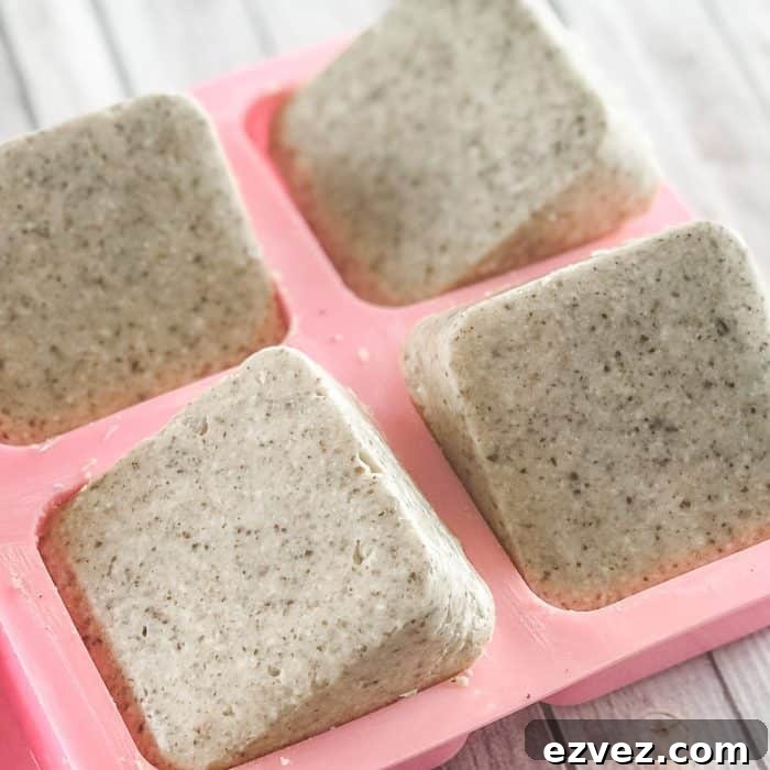 solidified homemade Lush Buffy Bars with essential oils popping out of silicone molds