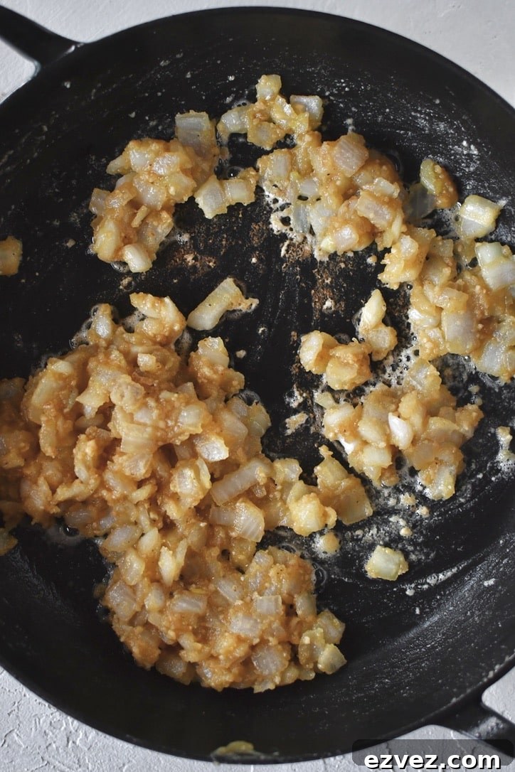 Cooked onions in roux before adding the stock to make the sauce.