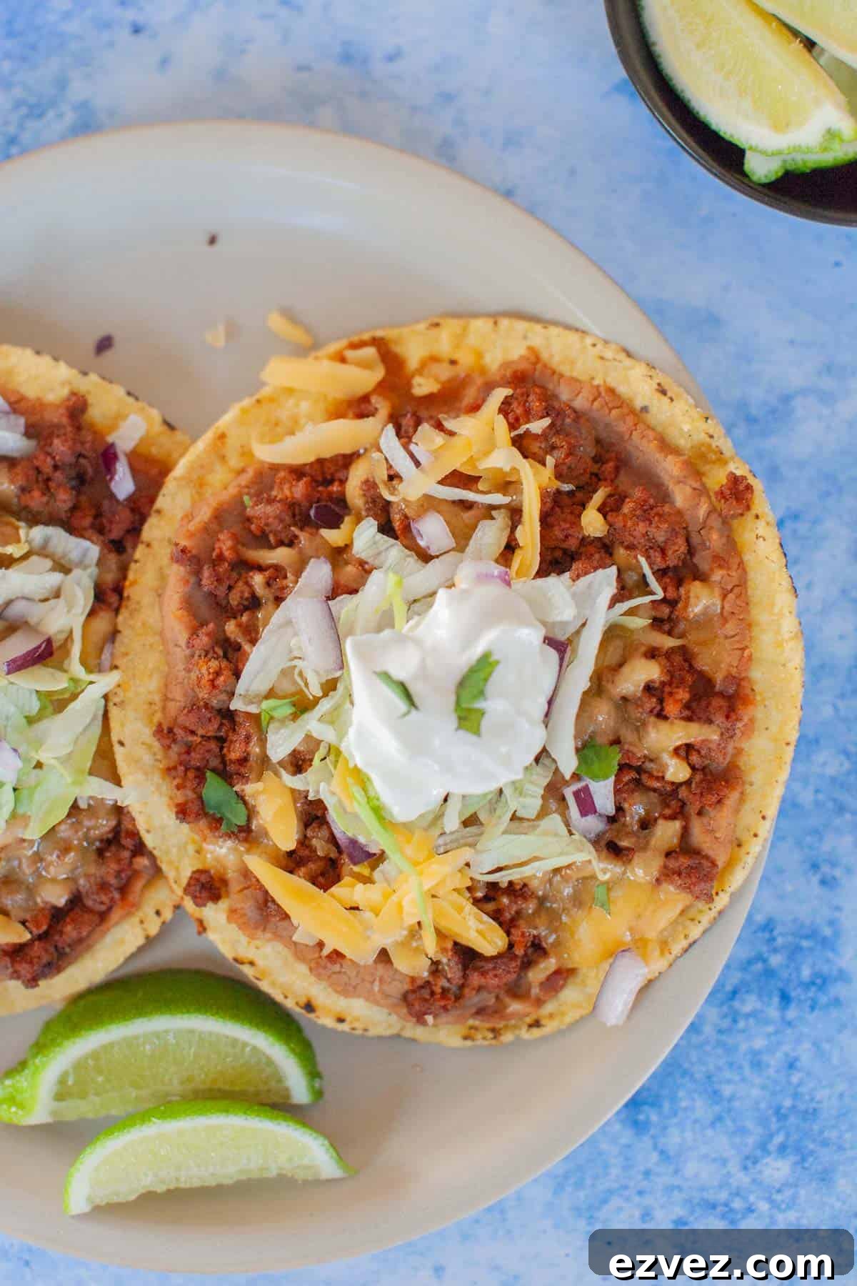 Mexican tostadas on a gray plate.