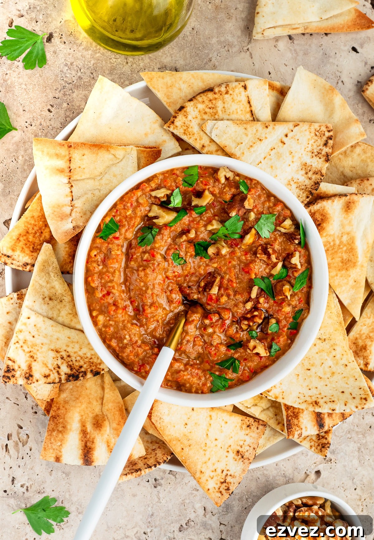 Bowl of M'hammara served with Pita chips.
