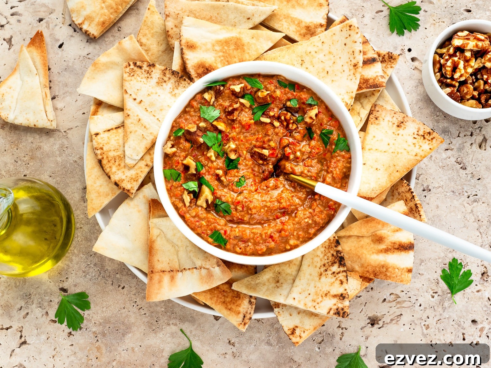 Bowl of M'hammara served with Pita chips.