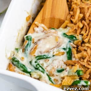 Close up view of green bean casserole in a dish.
