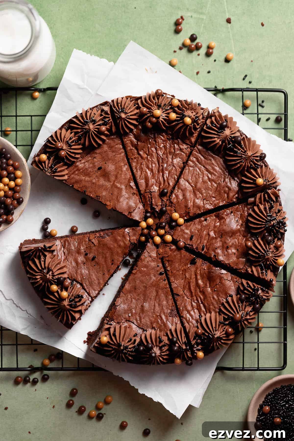 Fudgy Brown Butter Chocolate Brownie Cake Recipe 2 Chocolate brownie cake with milk chocolate frosting border and chocolate sprinkles.