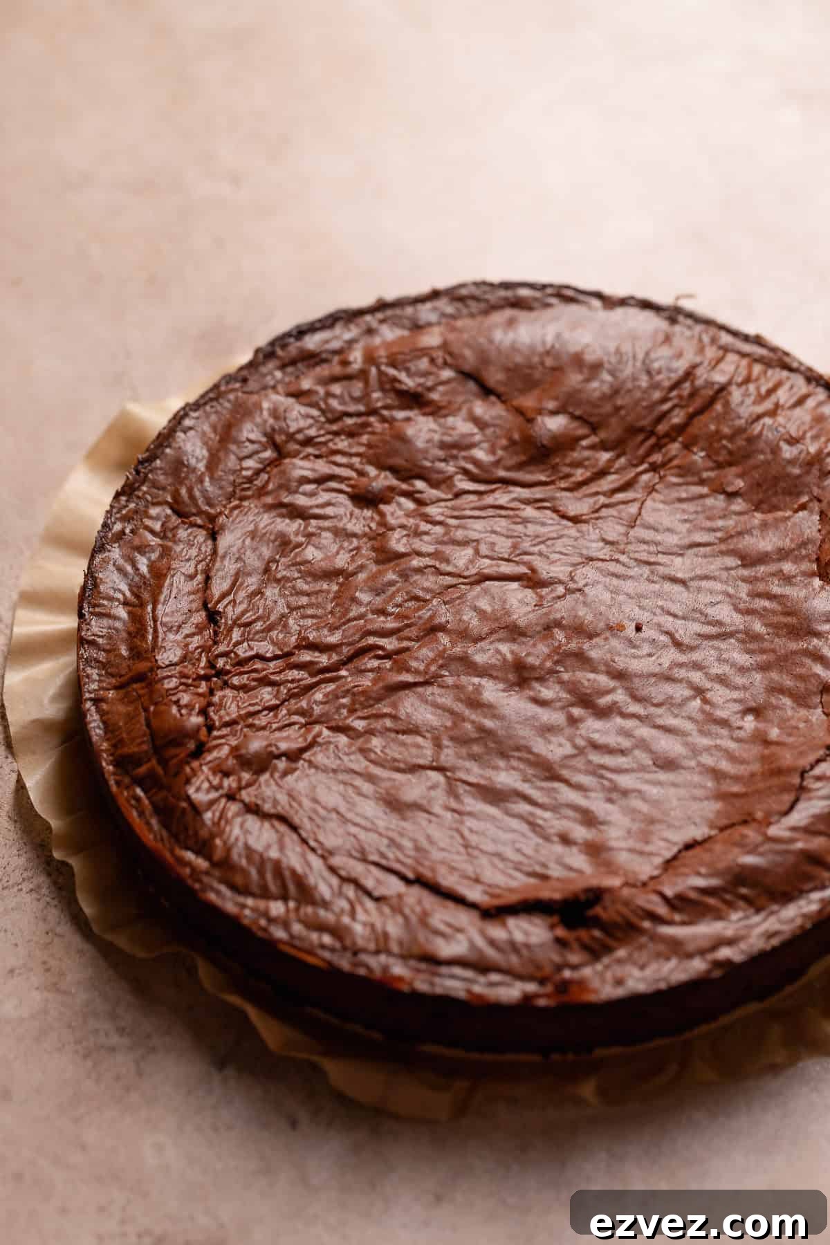 Fudgy Brown Butter Chocolate Brownie Cake Recipe 6 The brownie cake after baking on parchment paper.