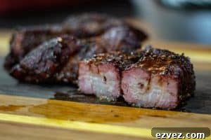 smoked country style pork ribs with a good bark and a light bbq sauce glaze