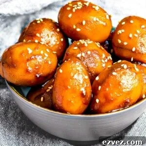 Korean Potato Side Dish, Gamja Jorim in a grey bowl on top of linen