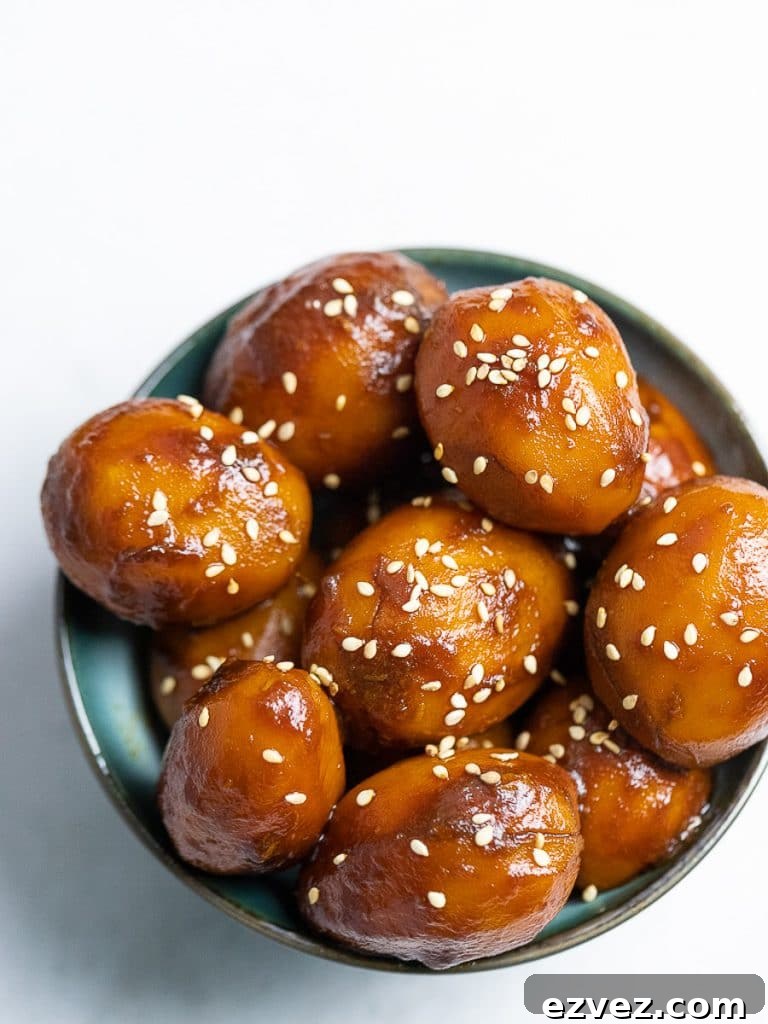 Korean Potato Side Dish, Gamja Jorim in a bowl with white background